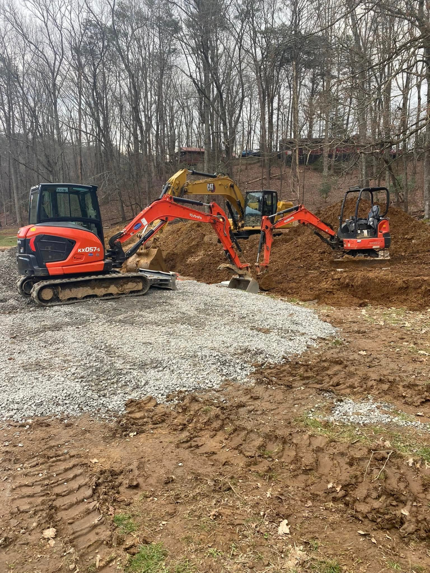 EMS mini-excavators staged on a prepared job site